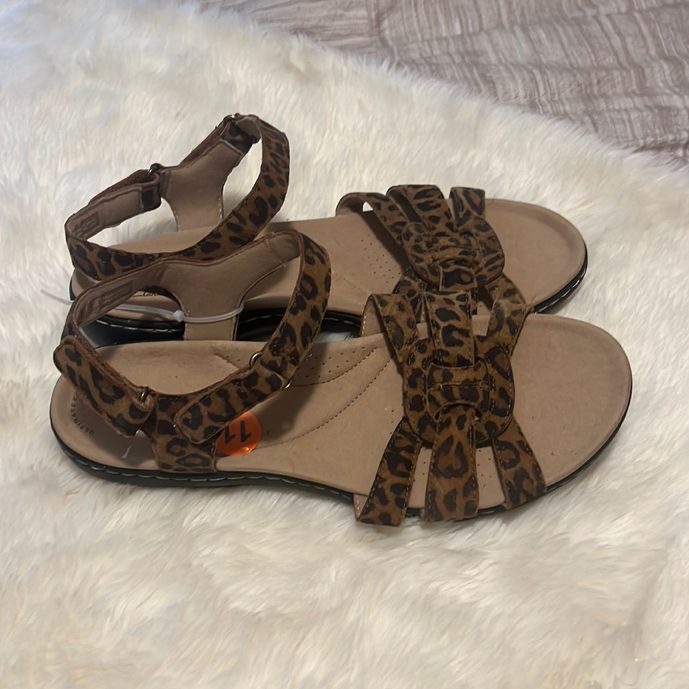Clarks leapord print sandals. New never worn.
